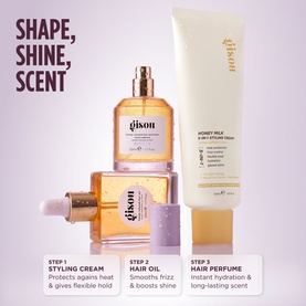Gisou Honey Infused Hair Perfume Lavender Berry shown with Honey Milk Hair Oil and styling cream in a 3-step haircare routine flat lay.