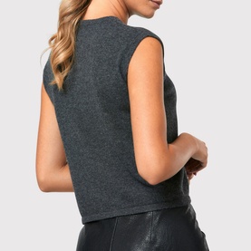 Model wearing Helen McAlinden Marlena Cashmere Top in grey, back view showing cap sleeves and knit structure, styled with black leather trousers