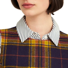 Model wearing Hobbs Margot Check Mini Dress in blue tartan check, styled with a white striped collared shirt underneath