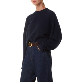 Model wearing Whistles Relaxed Cropped Sweater in blue wool, crew neck, long sleeves, styled with wide-leg navy jeans and brown belt