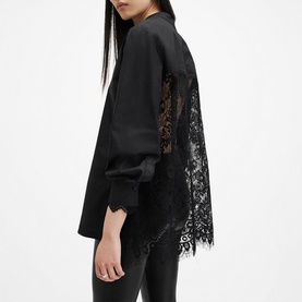 Model wearing All Saints Ethel Lace Embellished Shirt in black, rear view showing sheer floral lace back panel and long sleeves