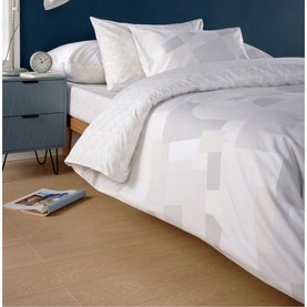 Christys Blocks Duvet Set White with printed geometric grey pattern, styled on a double bed with matching pillowcases