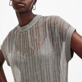 Model wearing All Saints Giana Open-Stitch Dress in grey, with metallic yarn detailing and open-stitch design, crew neck, short sleeves