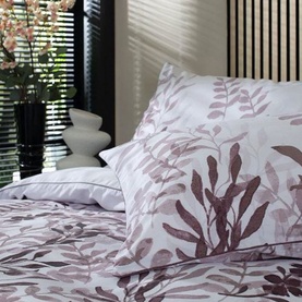 The Lyndon Company All Grown Up Duvet Set Pink, 100% cotton with botanical leaf print in mauve and pink tones, styled on a bed