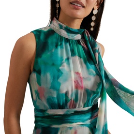 Model wearing Phase Eight Lucinda Floral Dress in teal and multi watercolour floral print, featuring high neckline and draped detail