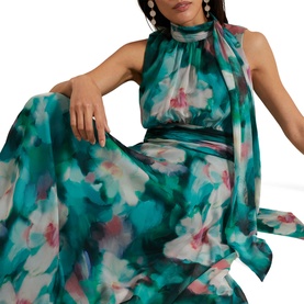 Model wearing Phase Eight Lucinda Floral Dress in teal multi, watercolour floral maxi with high neck, sleeveless silhouette and waist detail