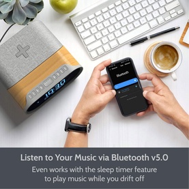 IBox Radio Silver Bluetooth speaker on desk, shown pairing with smartphone. Fabric and wood finish with LED clock display