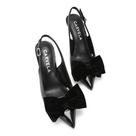 Carvela Lavish Bow Slingback Pumps in black with velvet bow embellishment, pointed toe, stiletto heel, and buckle slingback strap