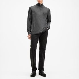 Model wearing All Saints Kilburn Half-Zip Sweater in grey with ribbed trims and logo detail, styled with black trousers and shoes