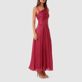 Model wearing Forever New Nya Ruched Asymmetric Dress in raspberry, asymmetric ruched bodice, pleated maxi skirt, styled with strappy heels