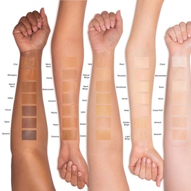 TOO FACED Travel Size Born This Way Super Coverage Concealer shade range swatched across three arm tones, showing Natural Beige among multiple shades