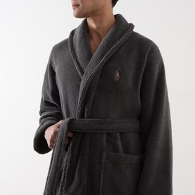 Model wearing Ralph Lauren Polo Player Logo Robe in grey plush cotton, featuring shawl collar, wrap front, belt and patch pocket visible