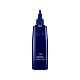 Oribe Supershine Mirror Rinse Glass Treatment in a tall blue bottle with precision applicator tip