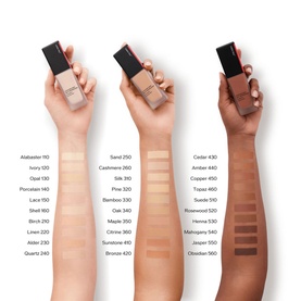 Shiseido Synchro Skin Self Refreshing Foundation 30ml shade range displayed across multiple skin tones, held by four hands