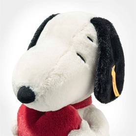 Steiff Bears Snoopy plush soft toy, white and black with red jumper, yellow ear tag, close-up detail shot
