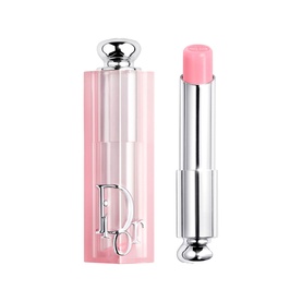 Dior Addict Lip Glow Lip Balm in 001 Pink, shown open beside its faceted pink case with silver cap