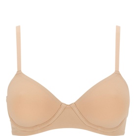 Skims Unlined Demi Bra in Clay beige, non-wired with smooth moulded cups and adjustable straps