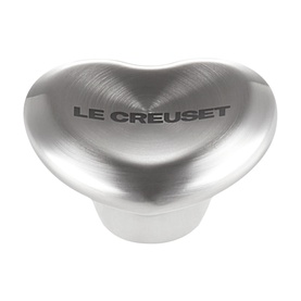Le Creuset stainless steel heart-shaped lid knob with brushed finish and engraved branding