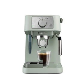 DeLonghi Stilosa Manual Espresso Maker in green with silver steam wand, shown with a filled glass espresso cup