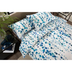 The Lyndon Company Pearls Duvet Set Multi in white with blue and teal watercolour dot print, styled on a bed with matching pillowcases