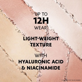 YSL All Hours Hyper Luminize highlighter swatch showing light peach and pink tones with text highlighting 12H wear and hyaluronic acid formula
