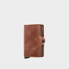 Secrid Vintage Leather Twin Wallet in brown with button fastening, dual card compartments and embossed logo detail