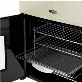 Belling Farmhouse Electric 60cm Range Cooker in cream, open oven door revealing chrome wire shelves and grill tray inside cavity