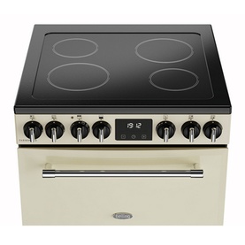 Belling Farmhouse Electric 60cm Range Cooker in cream with black ceramic hob, chrome knobs, and digital display oven below