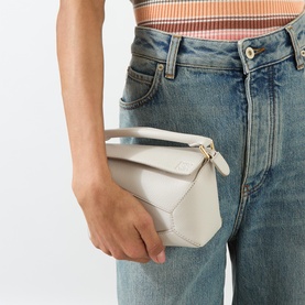 Puzzle Edge Mini Crossbody Bag