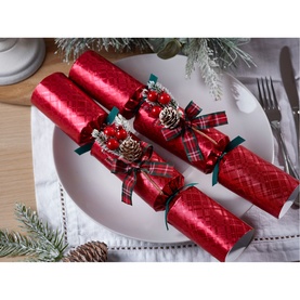 Robin Reed Glencoe Christmas Crackers set of six in red with tartan bows, berry and pinecone embellishments, styled on a festive table setting