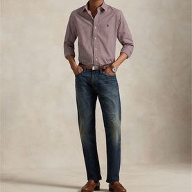 Model wearing Ralph Lauren Gingham Check Stretch Shirt in Wine with dark blue jeans and brown shoes