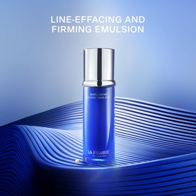 La Prairie Skin Caviar Hydro Emulsion Moisturiser 30ml in cobalt blue bottle with silver cap on blue wave background