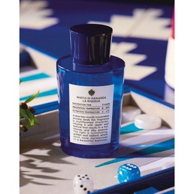 Acqua di Parma Mirto di Panarea La Riserva Eau de Parfum 50ml, cobalt blue bottle styled on backgammon board with blue dice