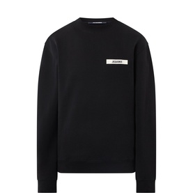Jacquemus Le Gros Grain Logo Sweatshirt in black, crew neck with small logo patch on chest, ribbed trims, straight hem