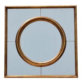 Square gold-framed wall mirror with large circular gold ring detail at centre, divided into four mirrored panels