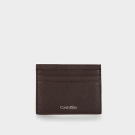 Calvin Klein Foil Logo Card Wallet in dark brown pebbled leather with silver foil embossed logo, six card slots