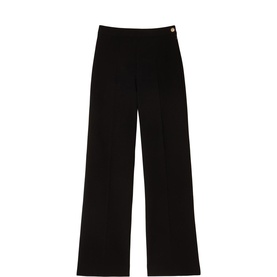 Sandro Wide Leg Trousers in black with pressed pleats, side button placket fastening and gold decorative button detail