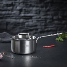 Kuhn Culinary Fiveply 3-Piece Saucepan Set in stainless steel, showing lidded saucepan with long handle on dark surface