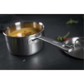 Kuhn Culinary Fiveply 3-Piece Saucepan Set in stainless steel, showing saucepan filled with sauce, lid resting alongside on dark surface