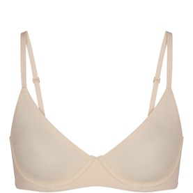 Skims Underwire Demi Bra in nude, smooth fabric with underwire support and adjustable straps