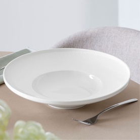 Villeroy & Boch Afina Deep Plate 29cm in white premium porcelain with ring-shaped relief and raised rim, styled on a dining table