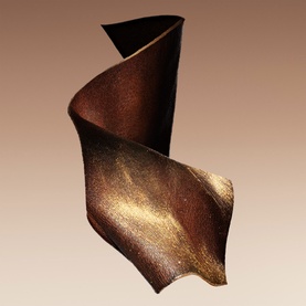 Armani Beauty EDP sculptural twisted metallic bronze and gold bottle, shown as abstract curved form detail shot