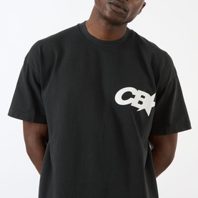 Model wearing Cole Buxton T-Shirt in Vintage Black, 100% cotton, with white CB logo graphic on chest