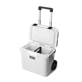 Yeti Roadie&reg; 32 Wheeled Cooler Box in white, open lid, retractable periscope handle extended, NeverFlat wheels and interior visible
