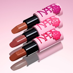 NARS Explicit Lipstick in Scandal, 3.8g, three nude-to-brown bullet shades with pink lace-up packaging and floral cap detail