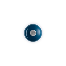 Le Creuset Classic Pepper Mill in blue, viewed from above, showing embossed silver P metal knob on smooth domed lid