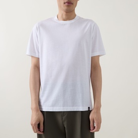Model wearing Boggi Milano white cotton T-shirt with crew neck and short sleeves, styled with dark olive trousers.