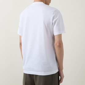 Model wearing Boggi Milano white cotton T-shirt, back view, styled with khaki trousers.