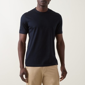 Model wearing Boggi Milano Solid Logo T-Shirt in navy blue, round neck, short sleeves, styled with beige chinos.