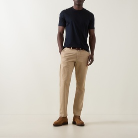 Model wearing Boggi Milano Solid Logo T-Shirt in Navy Blue with beige chinos and brown suede shoes.